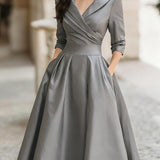 Dharmay | Elegante vestido midi de manga larga