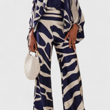 Sybella Conjunto de Dos Piezas con Hombros Descubiertos y Pantalones Amplios Estampados