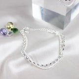 Conjunto de pulseras de plata elegantes con piedras de zirconia