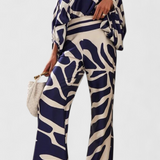 Sybella Conjunto de Dos Piezas con Hombros Descubiertos y Pantalones Amplios Estampados