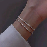 Conjunto de pulseras de plata elegantes con piedras de zirconia