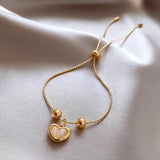 Pulsera de Corazón en Ópalo Melocotón con Baño de Oro