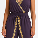 Donatila Mono Único con Detalles Dorados y Pierna Abierta